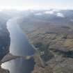 General oblique aerial view centred on Lochmore Lodge with Loch More beyond, looking SE.