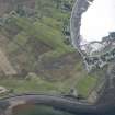 Oblique aerial view of Aird Point anti aircraft battery and Tighnafiline, looking ESE.