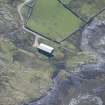 Oblique aerial view of Tournaig Farm barrage balloon site, looking SE.