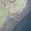 Oblique aerial view of a jetty at Gualann Mhor on the Isle of Ewe, looking NW.