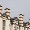 Detail of chimney stacks and pediments on east facing elevation..