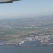 General oblique aerial view of Rosyth Naval Dockyard, looking N.