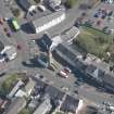 Oblique aerial view of Kilmaurs Market Cross and Tolbooth, looking NE.