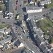 Oblique aerial view of Kilmaurs Market Cross and Tolbooth, looking NNE.