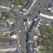 Oblique aerial view of Kilmaurs Market Cross and Tolbooth, looking NNW.