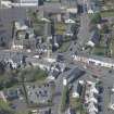 Oblique aerial view of Kilmaurs Market Cross and Tolbooth, looking WSW.