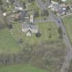 Oblique aerial view of St Maur's-Glencairn Parish Church, looking WNW.