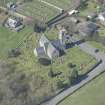 Oblique aerial view of St Maur's-Glencairn Parish Church, looking W.