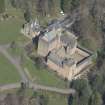 Oblique aerial view of Dean Castle, looking N.