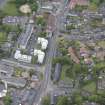 Oblique aerial view of Linlithgow High Street and West Port House, looking ENE.