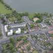 Oblique aerial view of Linlithgow High Street and West Port House, looking N.