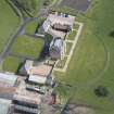 Oblique aerial view of Blackburn House, East Pavilion and West Pavilion, looking NE.