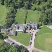 Oblique aerial view of Clifton Hall, stables and dovecot, looking WSW.
