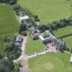 Oblique aerial view of Clifton Hall, stables and dovecot, looking S.