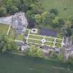 Oblique aerial view of Carlowrie Country House, walled garden, main stable block and Westfield Steading, looking SE.