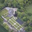Oblique aerial view of Carlowrie Country House, walled garden, main stable block and Westfield Steading, looking E.