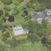 Oblique aerial view of Mortonhall House, terraced garden, stable court, looking NW.