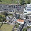 Oblique aerial view of St John and King's Church, looking NW.