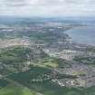General oblique aerial view of the East Lothian coast line to Edinburgh with Musselburgh in the foreground, looking WNW.