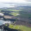 General oblique aerial view along the East Lothian coastline with Tantallon Castle in the foreground, looking SE.