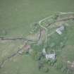 Oblique aerial view of Scalan Cottage and Roman Catholic Seminary, looking W.
