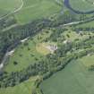 Oblique aerial view of Ballindalloch Castle, looking W.