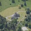 Oblique aerial view of Ballindalloch Castle, looking S.