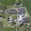 Oblique aerial view of Cardhu Distillery, looking SW.