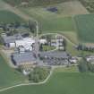 Oblique aerial view of Cardhu Distillery, looking NW.