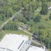 Oblique aerial view of Aberlour House West Lodge, looking NNW.