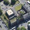 Oblique aerial view of Dumbarton Academy and Burgh Halls, looking SE.