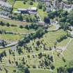 Oblique aerial view of the Holy Family Roman Catholic Church and Port Glasgow Cemetery, looking S.