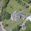 Oblique aerial view of New Kilpatrick Parish Church, looking NW.