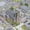 Oblique aerial view of St Mary's Parish Church, looking NNE.