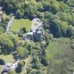 Oblique aerial view of Craigrownie Castle, looking SSE.