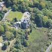 Oblique aerial view of Craigrownie Castle, looking SE.