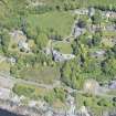 Oblique aerial view of Craigrownie Castle, looking NE.