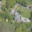 Oblique aerial view of Craigrownie Castle, looking NE.