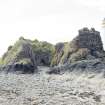 General view of castle from north east at low tide