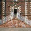 Detail of main entrance staircase including metalwork.