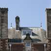 General view of roof architetcure including chiney stacks, and finials.