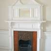 Detail of fireplace and overmantle in main hall.