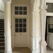 General view of doorway, arch, colonnade,  pillar and capital head..