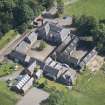 Oblique aerial view of the stables and coach house, Newliston House, looking NE.