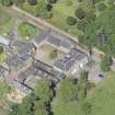 Oblique aerial view of the stables and coach house, Newliston House, looking NW.