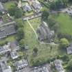 Oblique aerial view of Corstorphine Parish Church, looking E.