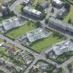 Oblique aerial view of 1-48 Ravelston Garden, looking ESE.