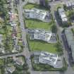 Oblique aerial view of 1-48 Ravelston Garden, looking ENE.