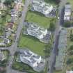 Oblique aerial view of 1-48 Ravelston Garden, looking NE.