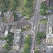 Oblique aerial view of 25 Learmonth Terrace, Dean Parish Church and Bristo Baptist Church, looking W.